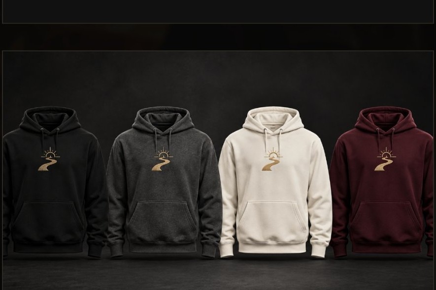Gold Path Hoodies in Black, Charcoal, Cream and Burgundy, each carrying the gold sunrise-path logo