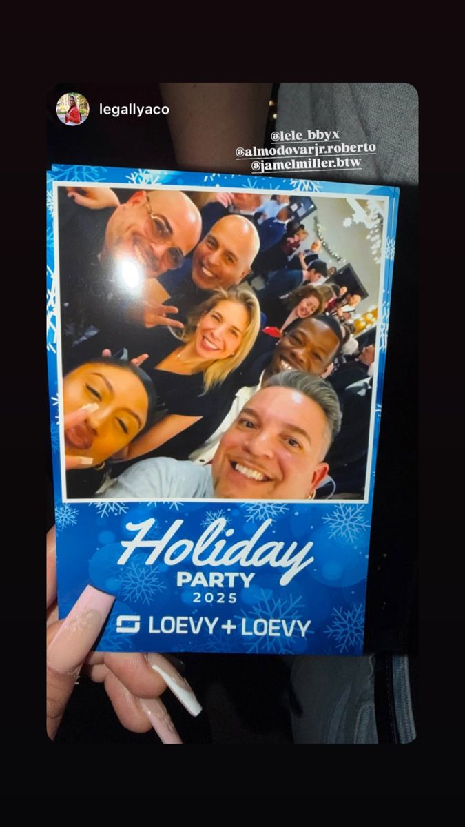 Photo-booth selfie from the Loevy + Loevy Holiday Party 2025
